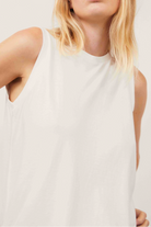 The Neva tank top in crispy white - front view, minimalist organic cotton design