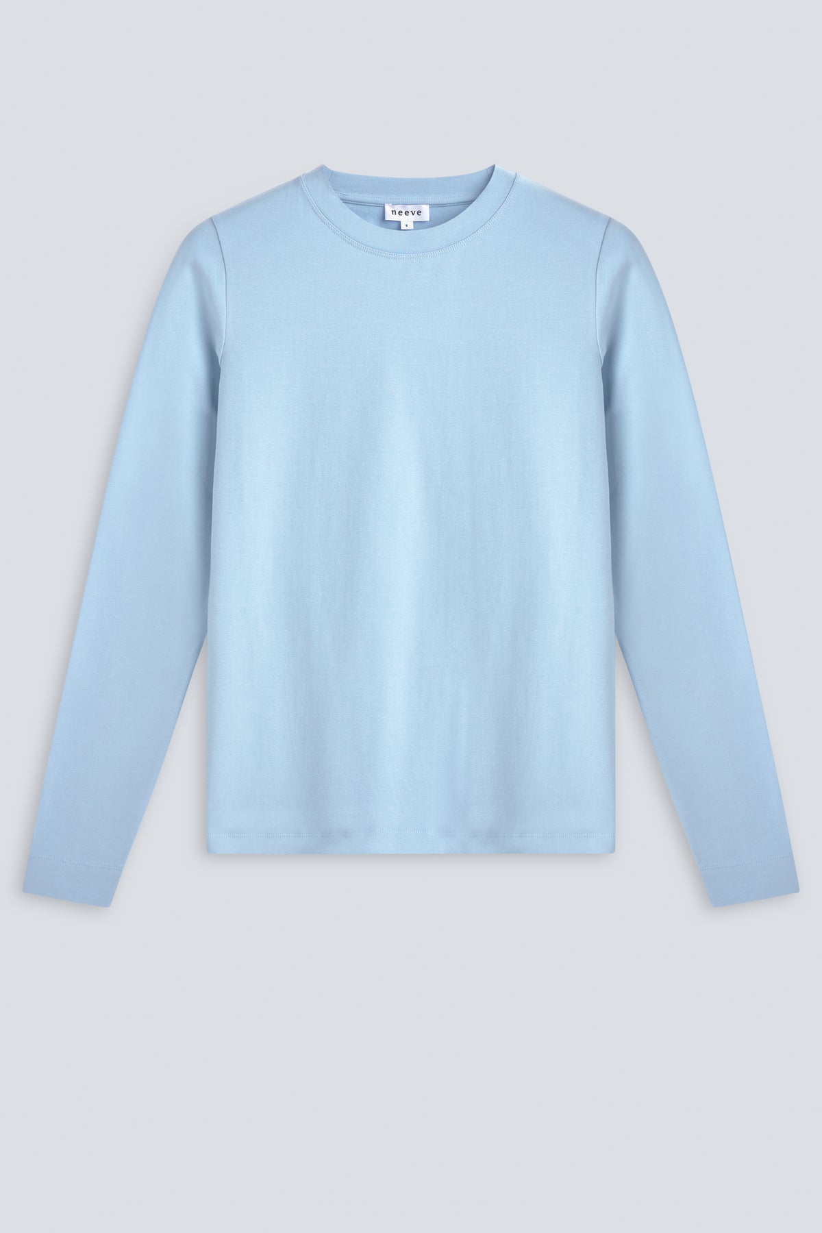 The Nora in Blue Fog. Front view. Body-skimming fit. Made in Portugal, 95% organic cotton with 5% elastane.