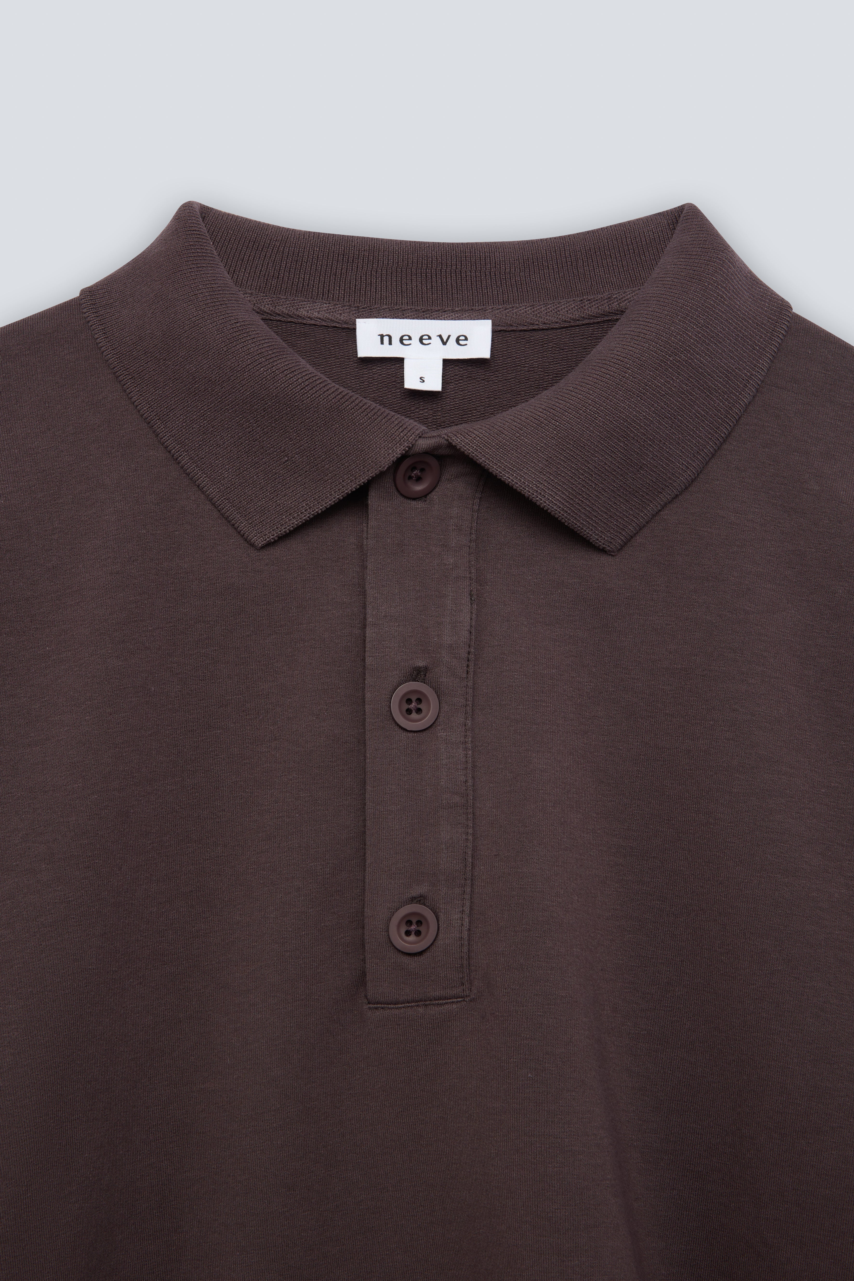The Remi in Plum. Polo long sleeve and a boxy shape.  Made from 100% organic cotton babyfleece. GOTS. Collar detail. 