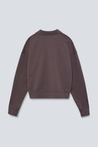 The Remi in Plum. Polo long sleeve and a boxy shape.  Made from 100% organic cotton babyfleece. GOTS. Back view.