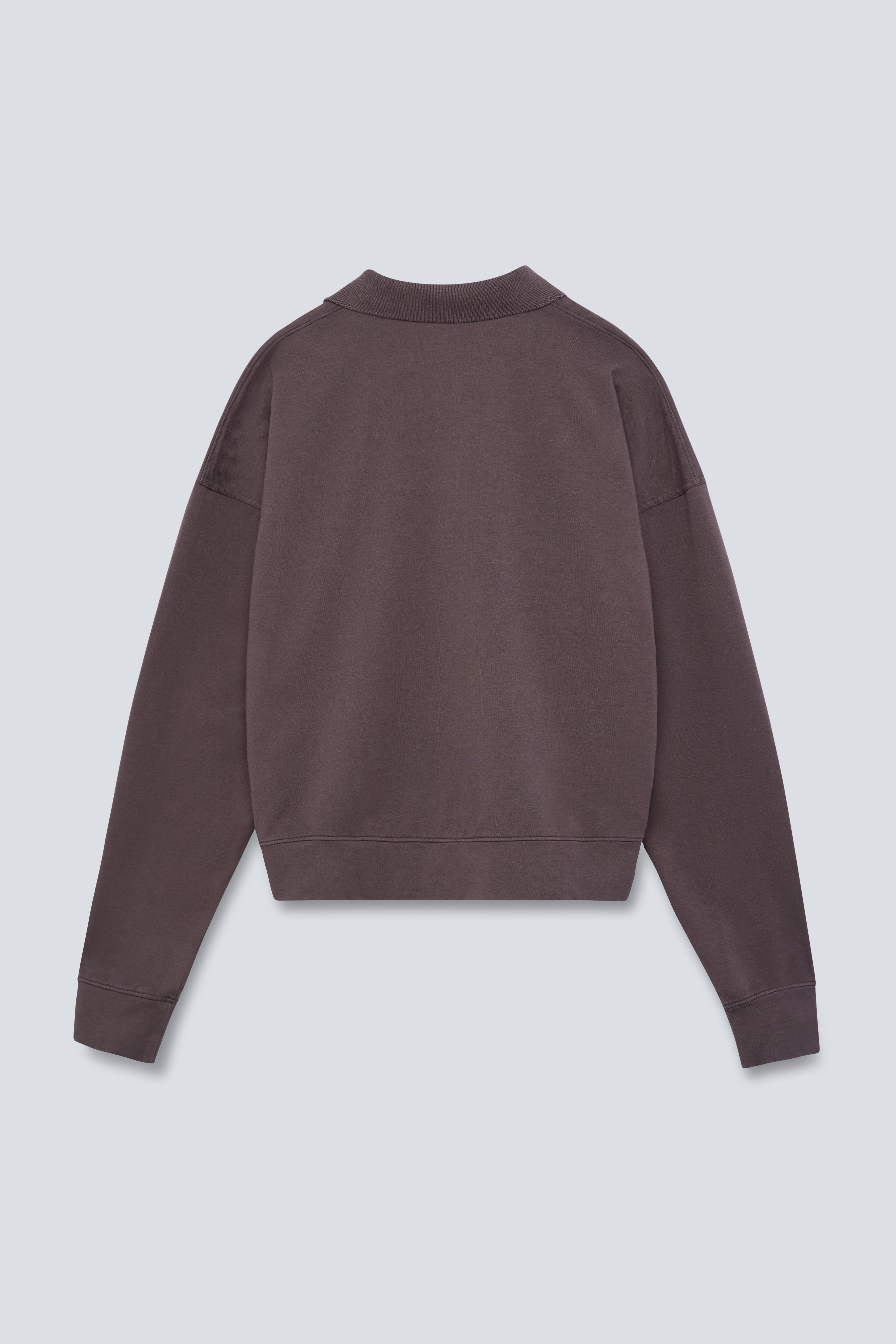 The Remi in Plum. Polo long sleeve and a boxy shape.  Made from 100% organic cotton babyfleece. GOTS. Back view.