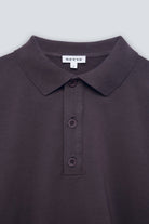 The Remi in Plum. Polo long sleeve with a boxy shape. Made from 100% organic cotton babyfleece. Collar detail.