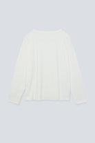 The Rose in Off-White. An oversized long sleeve that wears like a sweater, but lighter. 95% organic cotton with 5% elastane. GOTS. Back view. 