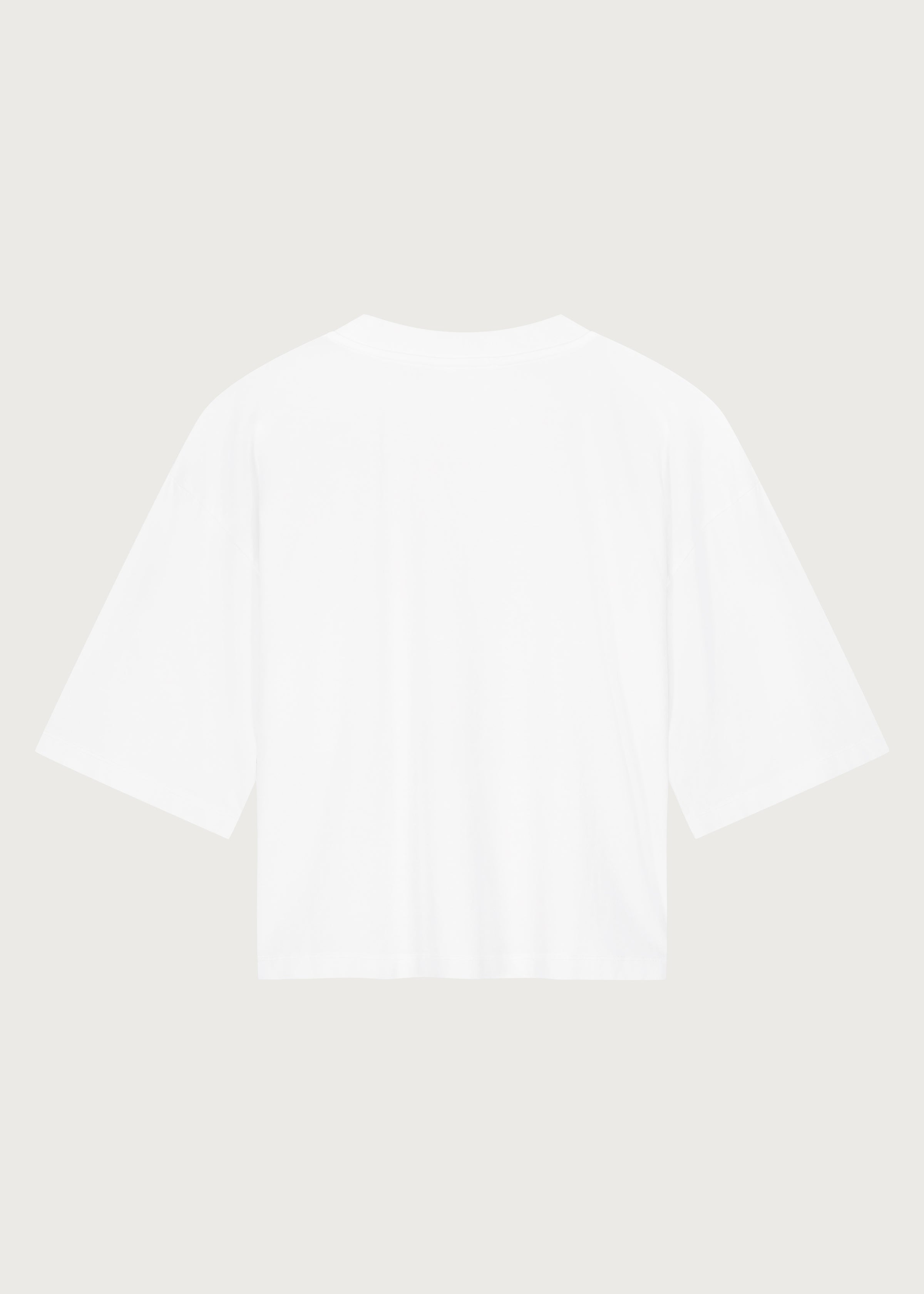 The Tess boxy tee crispy white back view, pocket detail, made in Portugal