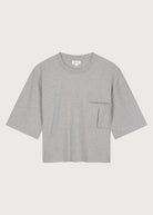 The Tess dropped shoulder tee in grey melange front view, pocket, 180g organic cotton