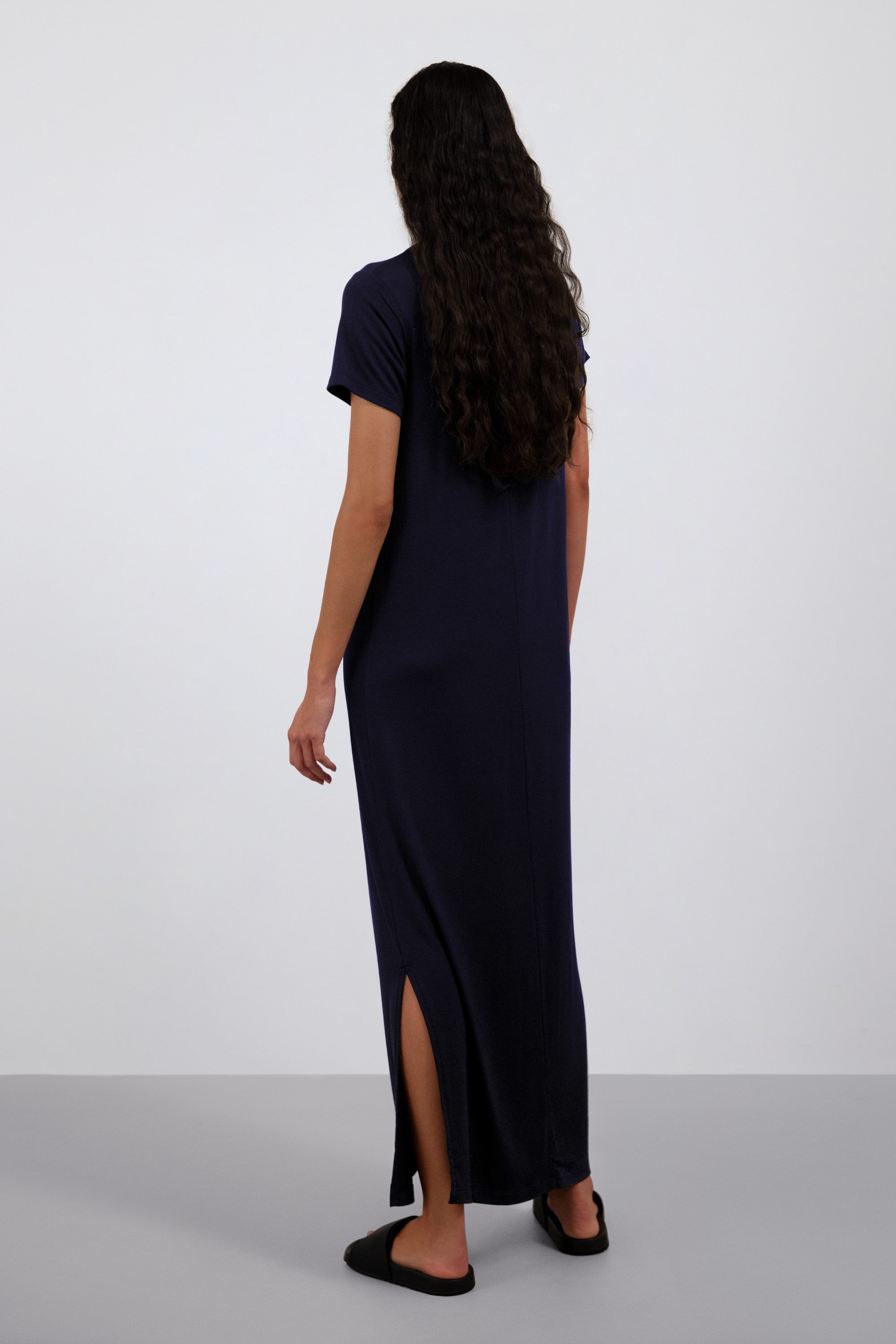 The Wren in Essential Black. 
95% Micromodal with 5% elastane. 
Shown on model. Back view. 