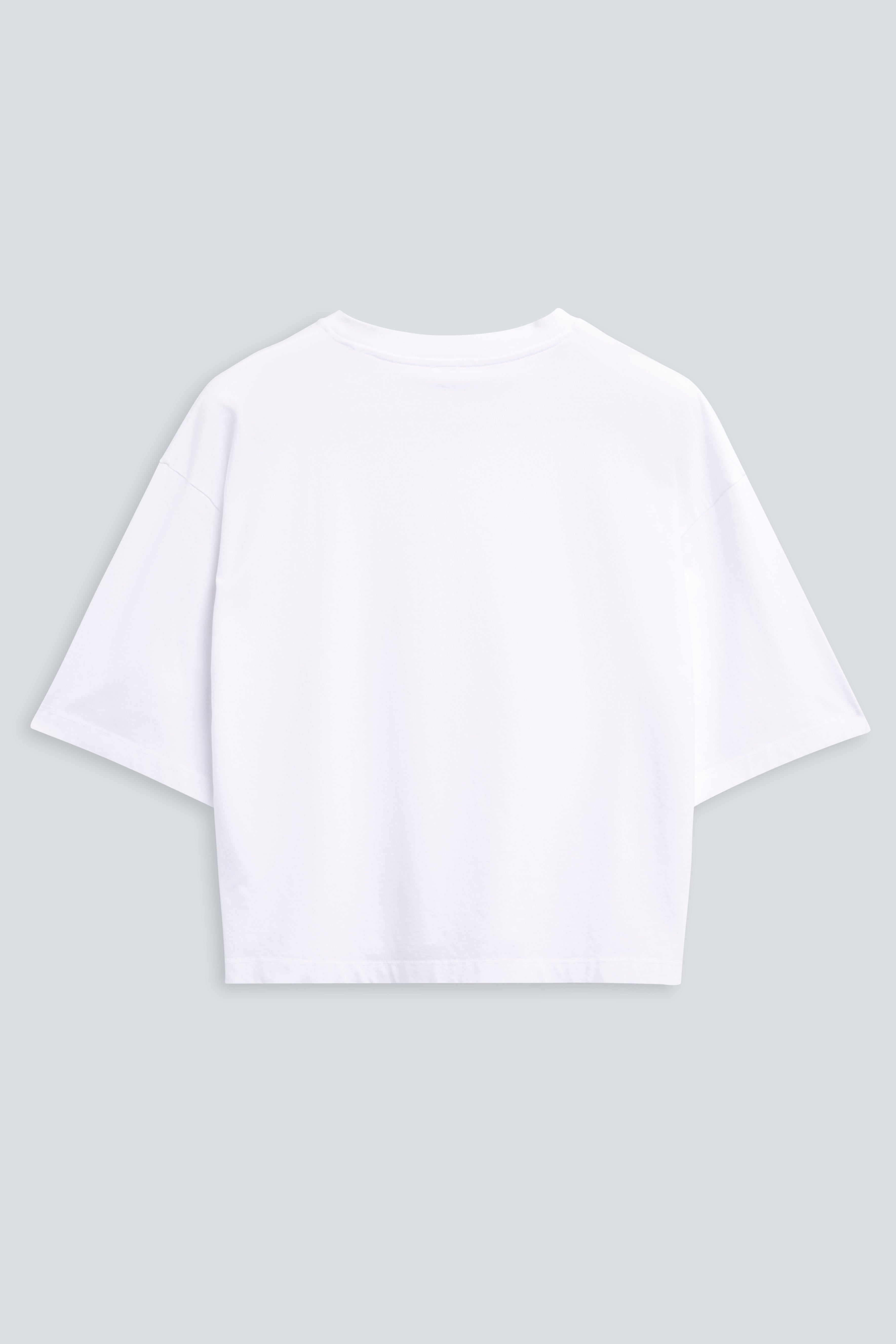 The Talia in Crispy White. Dropped shoulders and mid-length sleeves. 180 grams, 100% organic cotton. Back view.