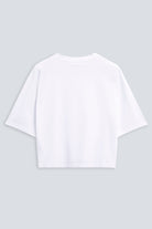 The Talia in Crispy White. Dropped shoulders and mid-length sleeves. 180 grams, 100% organic cotton. Back view.