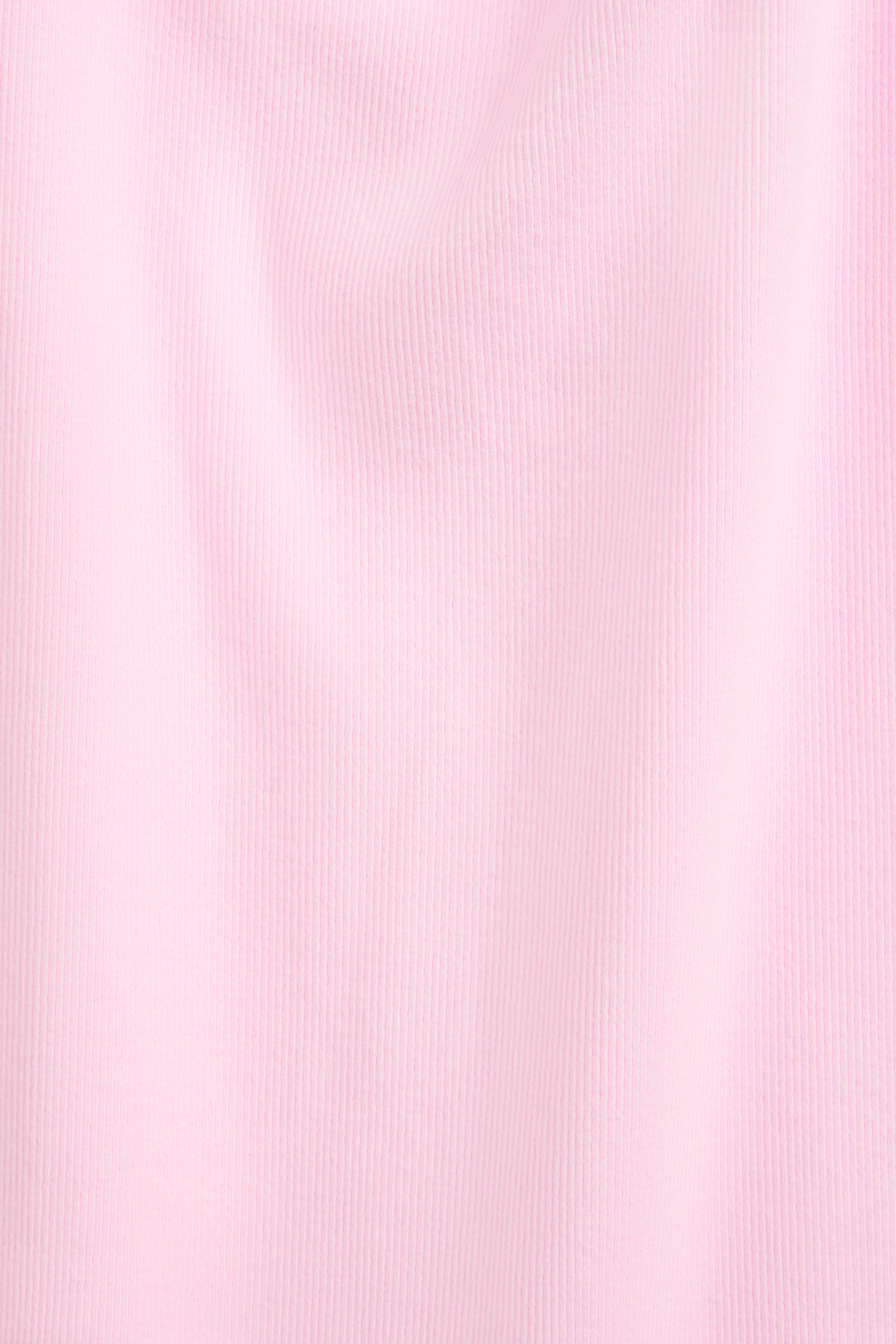 The Josie in Rose Pink. 95% organic cotton with 5% elastane. GOTS certified. Detail fabric. 
