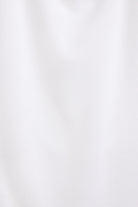 The Mika cap sleeve top in Crispy White. Detail fabric. 
