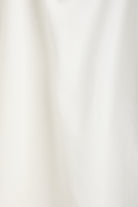 The Nora fitted long sleeve off-white, detail material 95% organic cotton 5% elastane