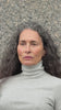 The Theresa in Grey Melange. A ribbed turtleneck cut from 95% organic cotton with 5% elastane. Shown on model. 