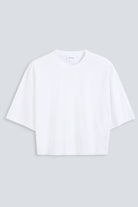 The Talia crispy white tee front view, dropped shoulders and mid-length sleeves, 180g organic cotton made in Portugal