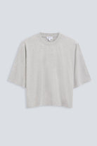 The Talia in Grey Melange. Front view. Dropped shoulders and mid-length sleeves, 180g, 100% organic cotton made in Portugal. GOTS