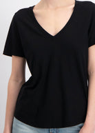 The Stella v-neck t-shirt in essential black, shown on model, GOTS certified organic cotton