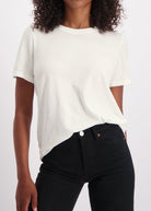 The Michelle crew-neck t-shirt in off-white shown on model, GOTS certified organic cotton
